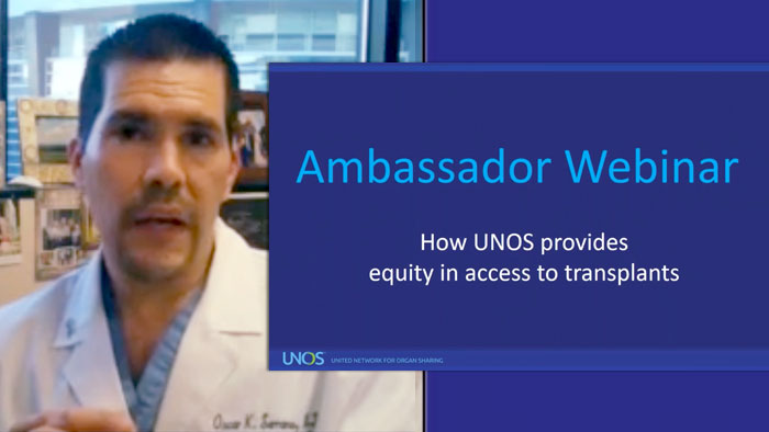 Oscar Serrano, M.D. talking during presentation on equity in access